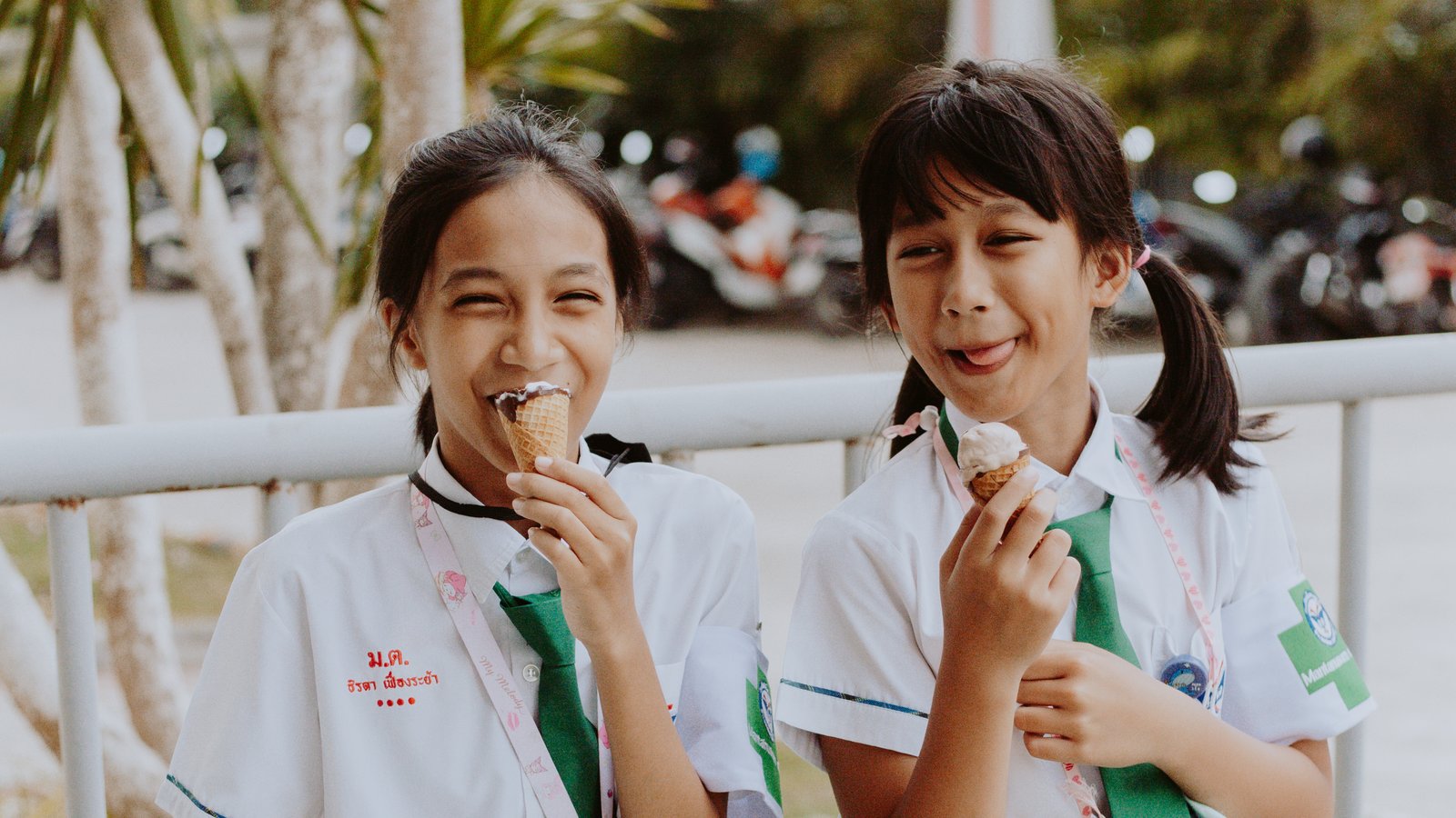 Why do Thai people often laugh when foreigners speak Thai?